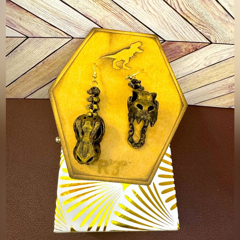 Articulated T-Rex skull earrings